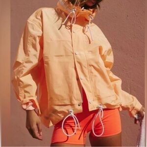 Free People Movement Rain and Shine Jacket in Morning Sun